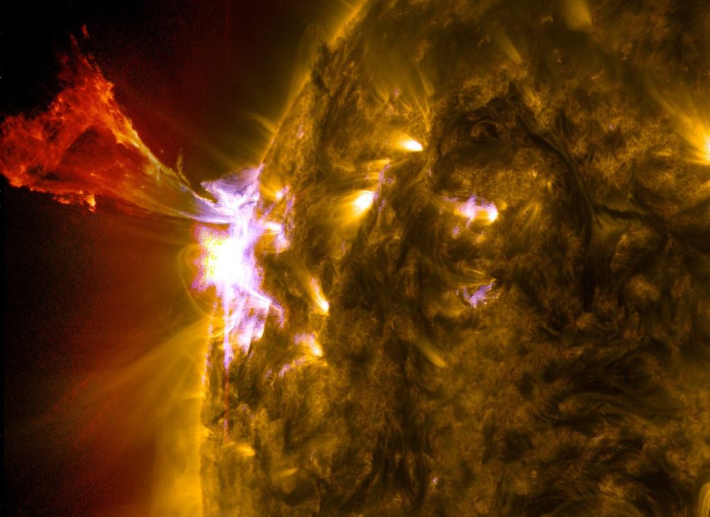 New Solar Flare Model Aims to Warn Operators Earlier The sun erupting with a bright solar flare, captured by a space telescope against the darkness of space.